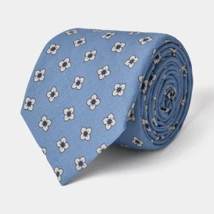 Cravate en soie et lin  –  Bleu clair à motifs fleurs blanches et bleues